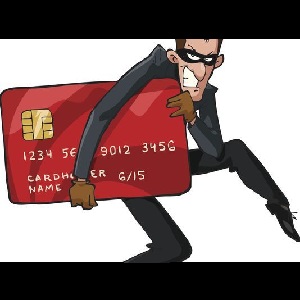 Bank account has changed - cartoon of a thief, wearing a mask, sneaking away with a credit card